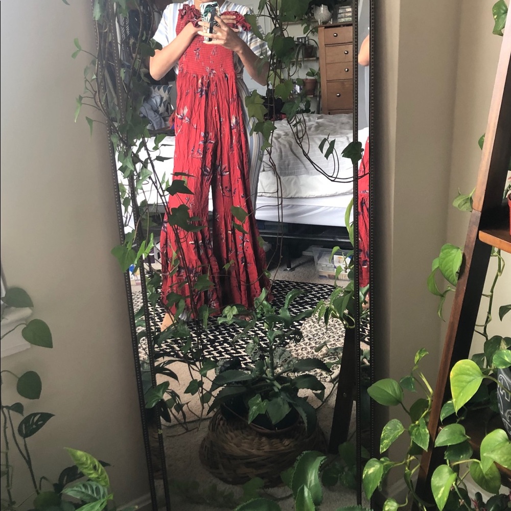 Red flowered jumpsuit with flared legs